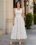 Vestido midi de lunares con volantes