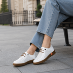 Zapatillas con diseño perforado de piel®