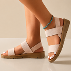 Sandalias planas con tiras elásticas®