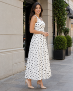 Vestido midi de lunares con volantes