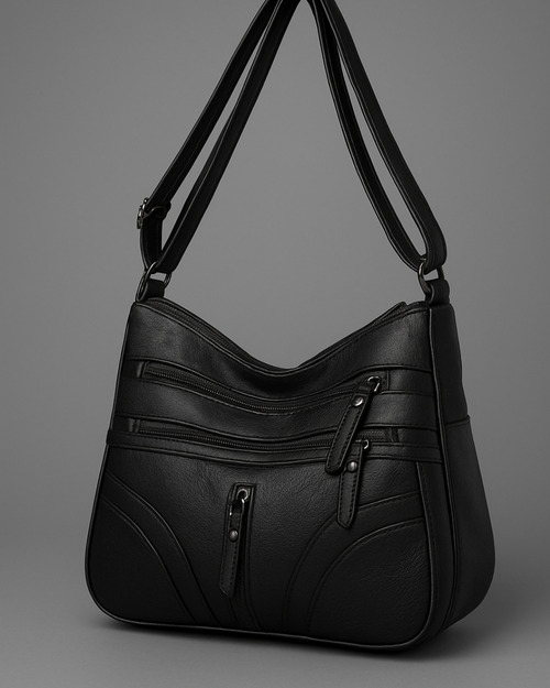 Bolso con múltiples compartimentos y textura suave®