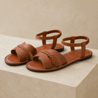 Sandalias planas con tiras trenzadas®