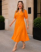 Vestido midi con botones y manga corta®