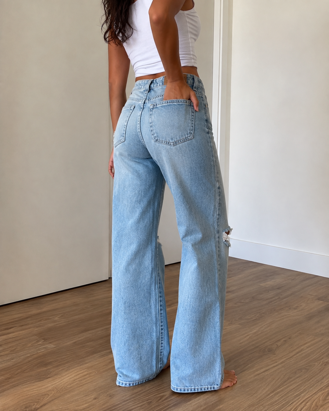 Pantalones holgados con rodillas rasgadas®