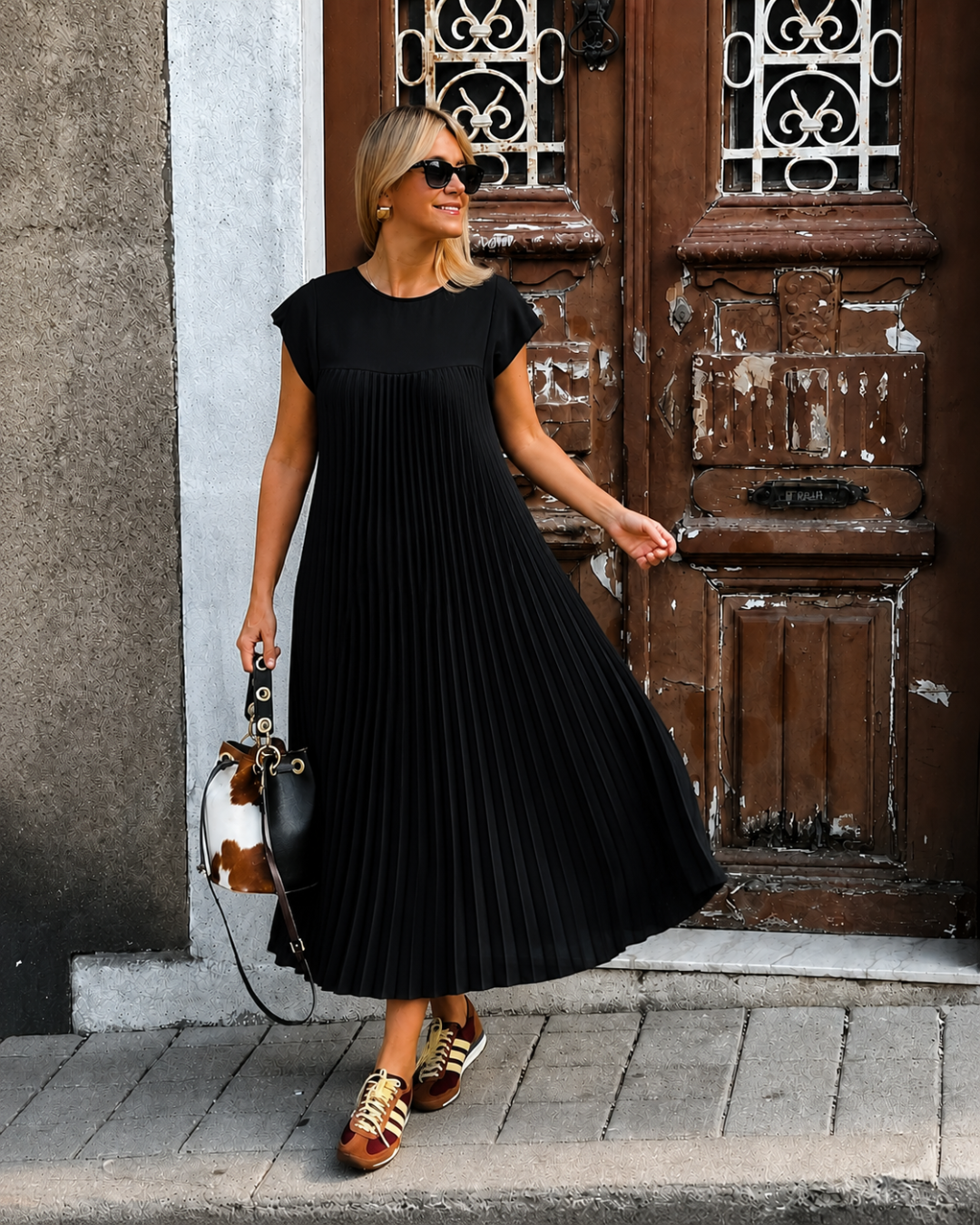 Vestido largo elegante con pliegues finos