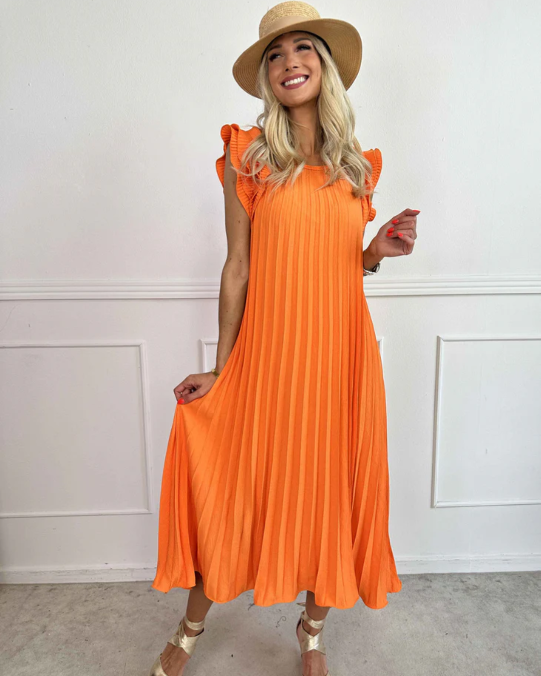 Vestido Plisado con Volantes