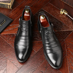 Botines de cuero con cremallera lateral